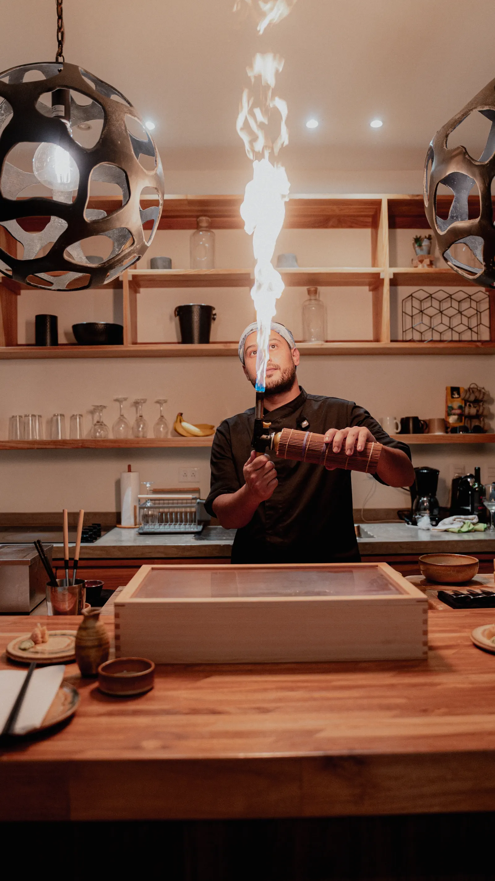 Yasumi private chef preparing omakase in a Santa Teresa villa