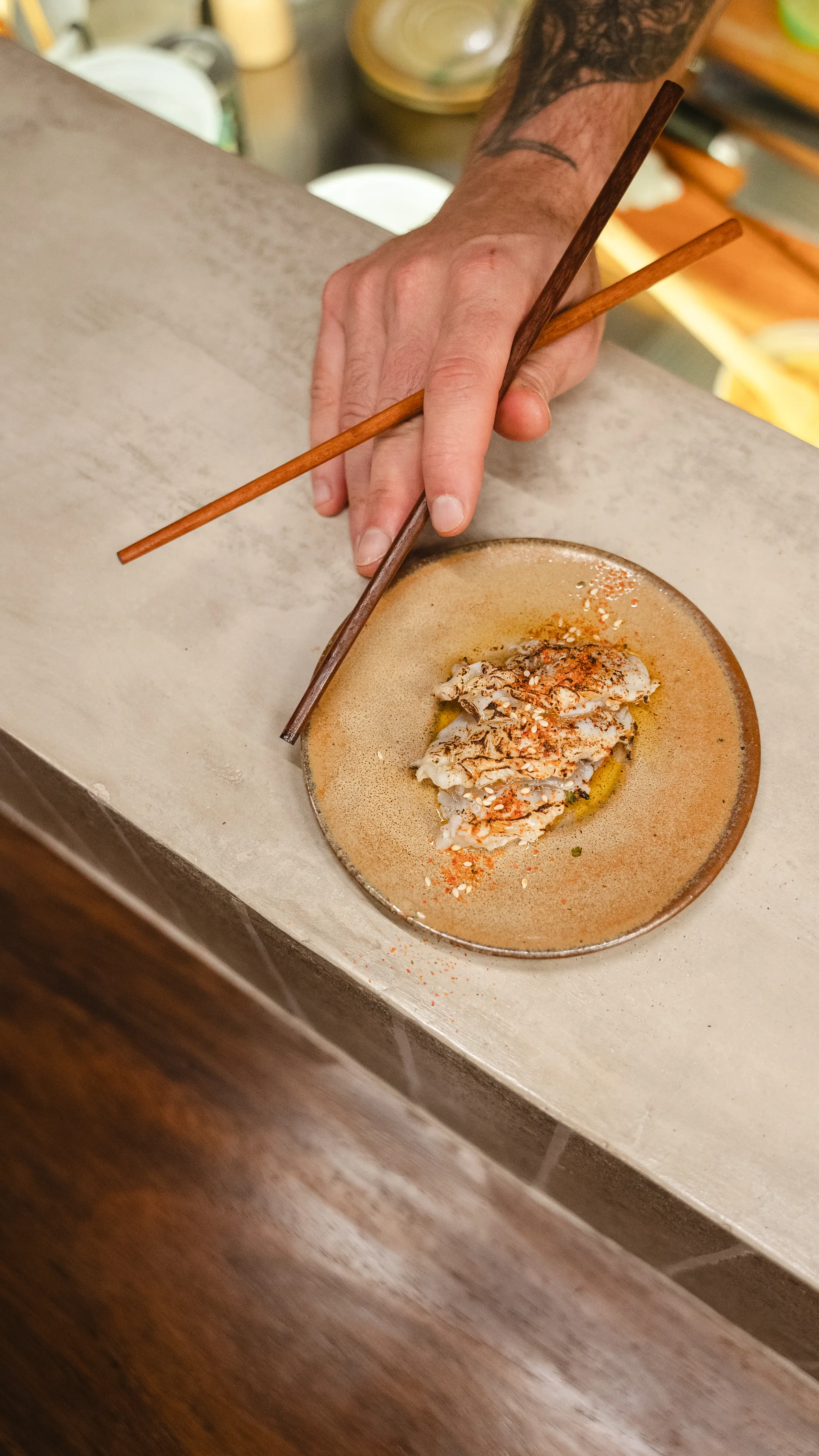 Lobster sashimi torched with golden butter and lemon at Yasumi