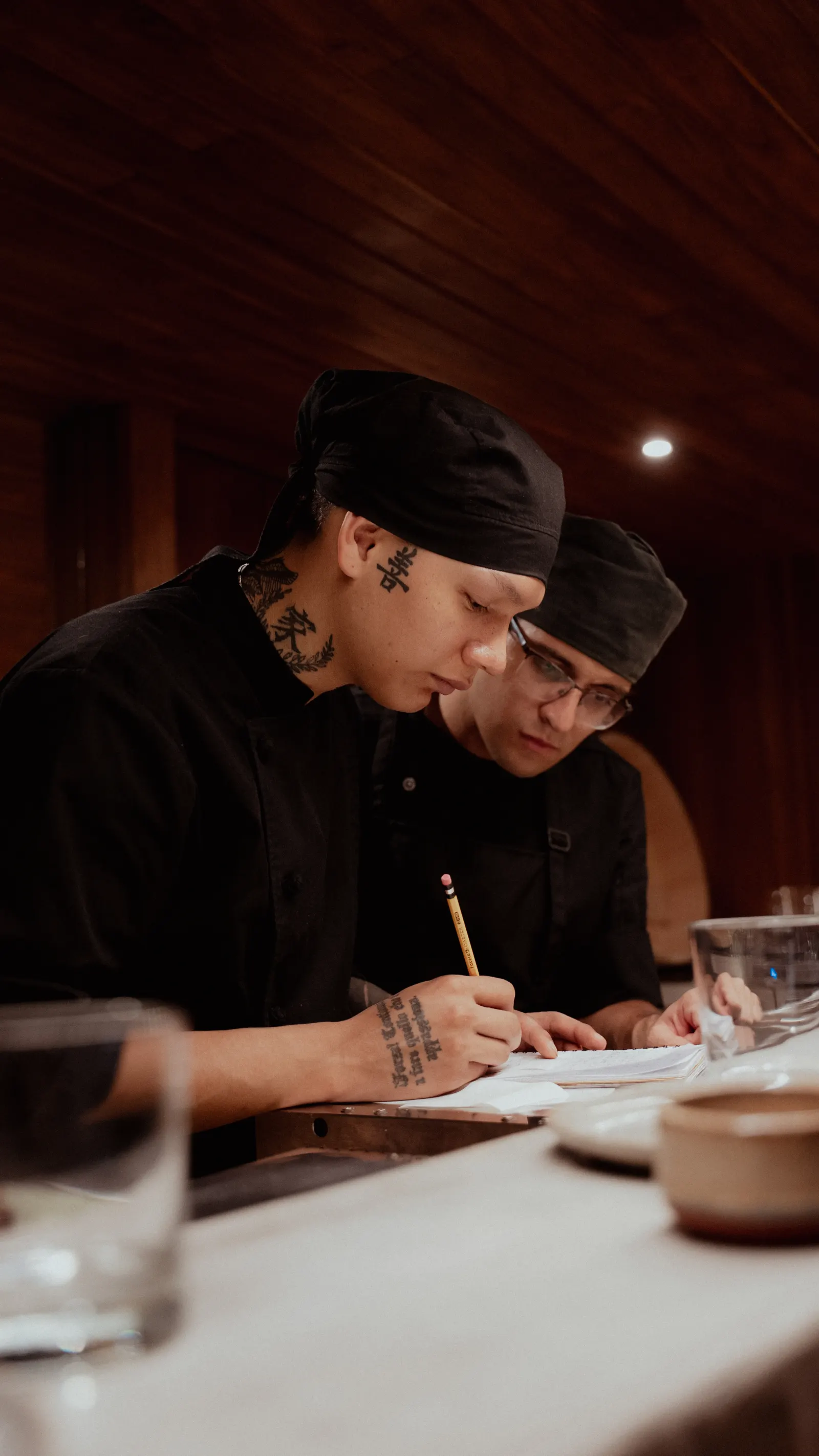 Chefs preparing sushi at the Yasumi counter in Santa Teresa